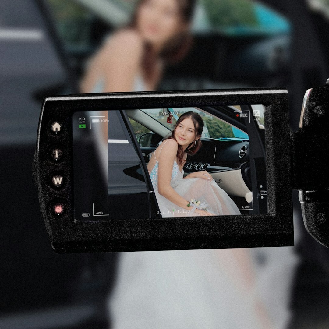 Young Australian woman operating a professional video camera