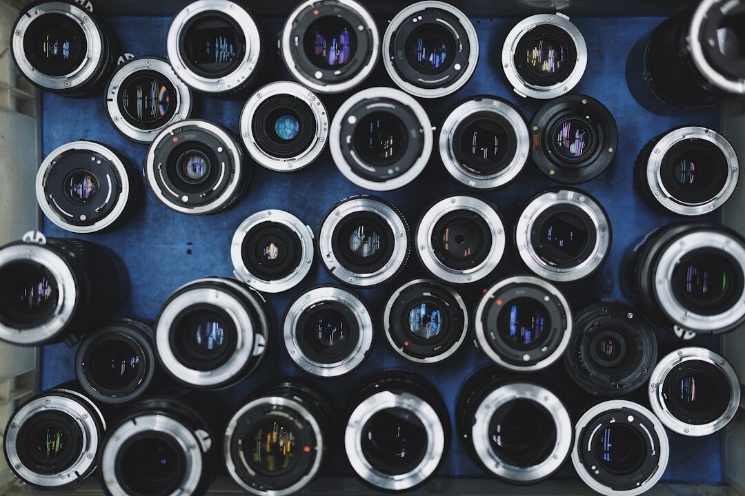 Collection of professional cinema lenses on a table