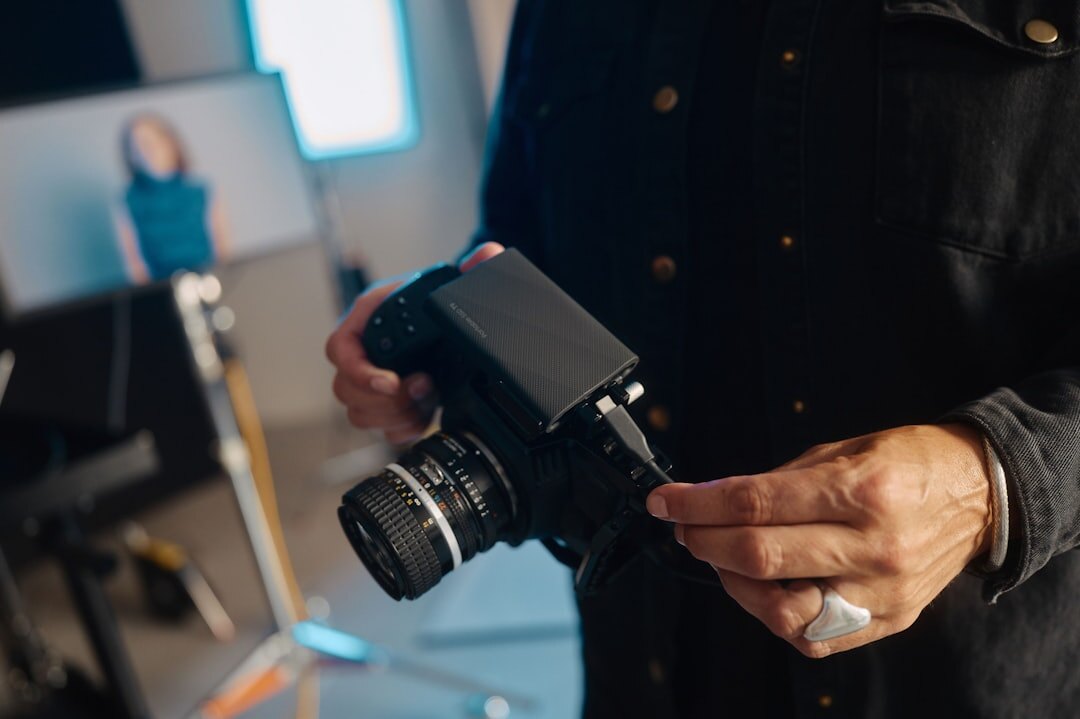 Online content creator filming with a mirrorless camera